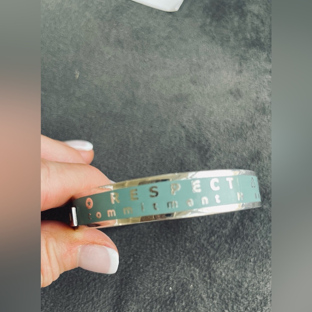 Bracelet
Silver in color
